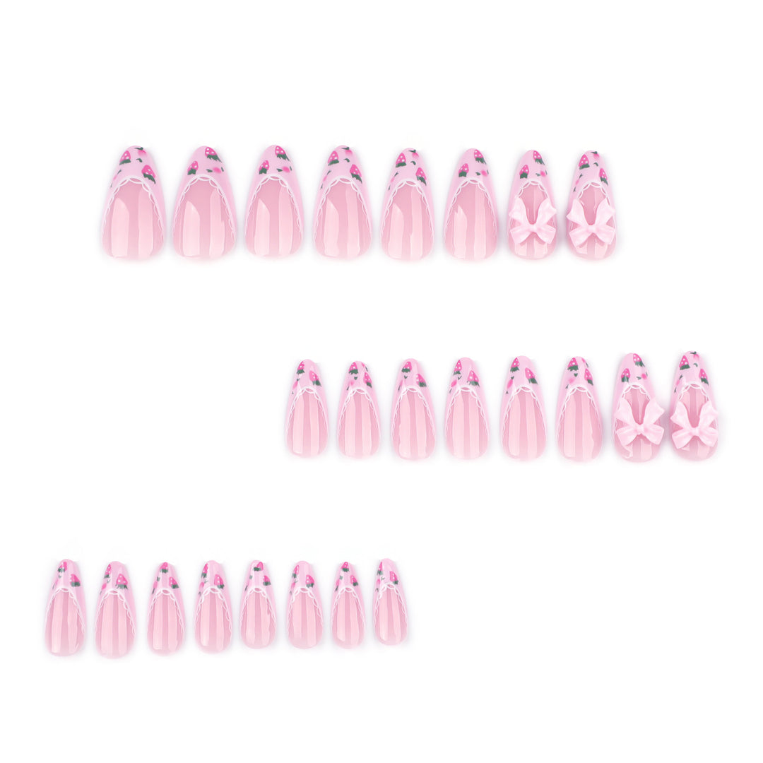 Artful stiletto nails with floral accents and bow embellishments Kalsten