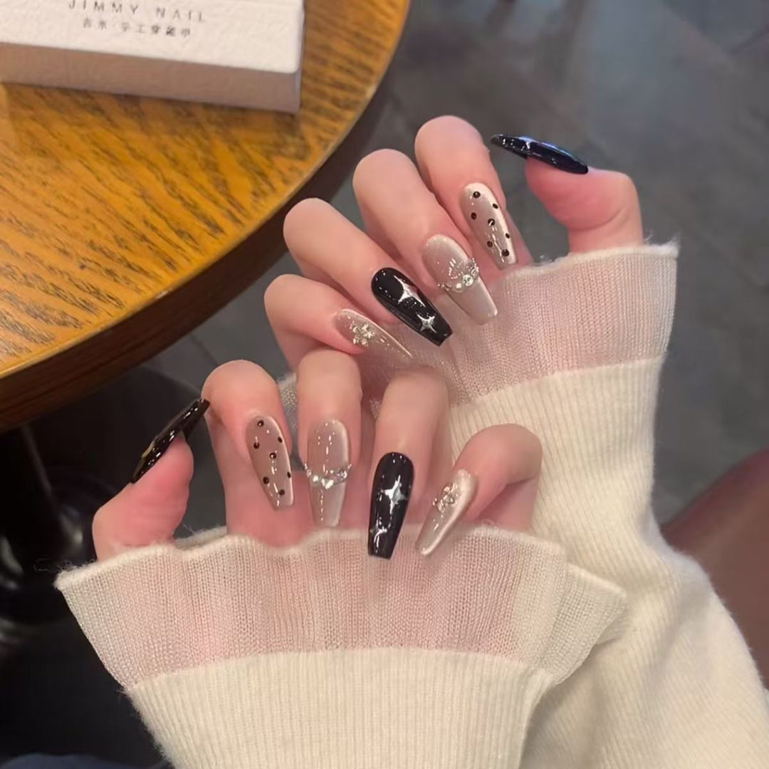 Stylish Press-On Nail Extensions with Decorative Accents