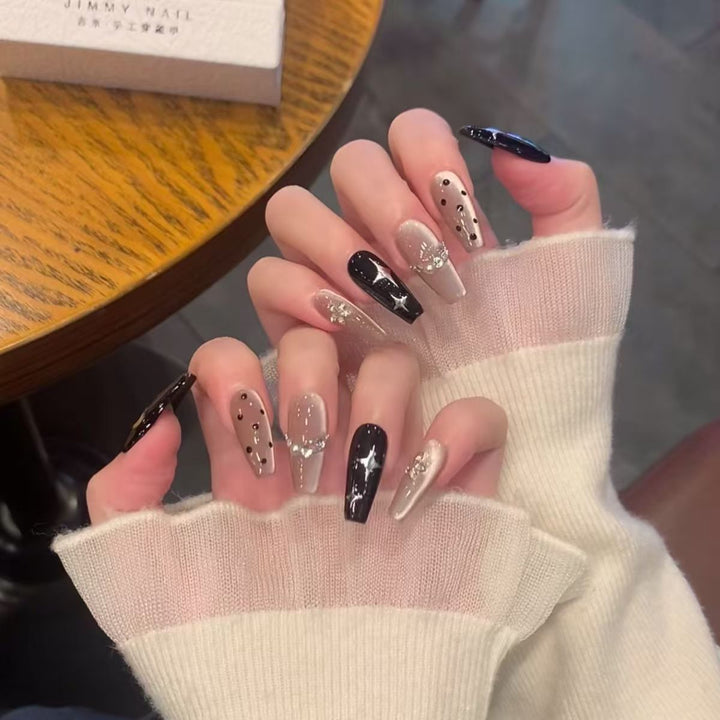 Stylish Press-On Nail Extensions with Decorative Accents
