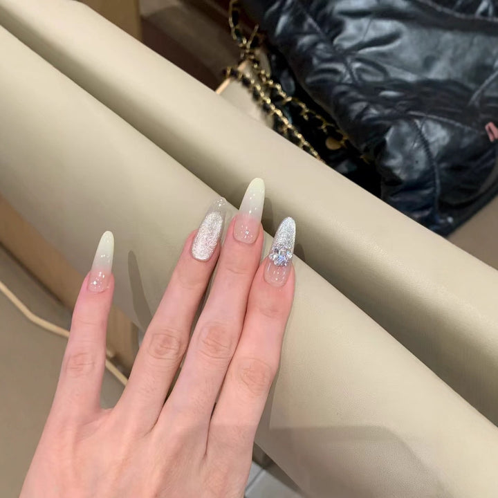 Glamorous Long Stiletto Nail Extensions with Rhinestone Accents