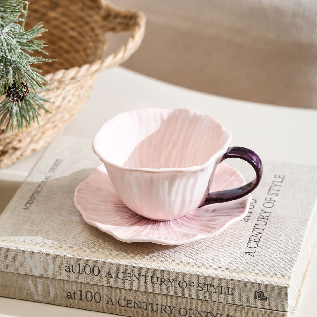 Ceramic mug with saucer in flower shape