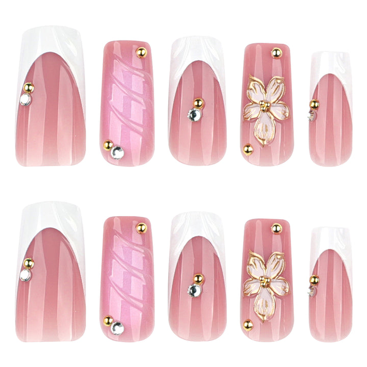 Glamorous gel nails with floral accent and glitter details Kalsten