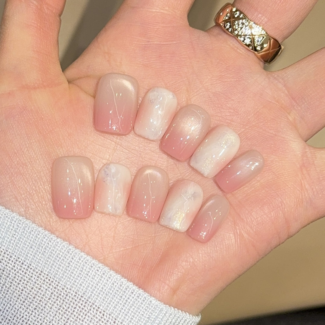Artificial nails with elegant gradient colors and holographic accents Kalsten