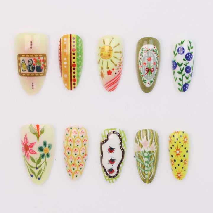 Nail art set with elaborate floral and colorful design Kalsten