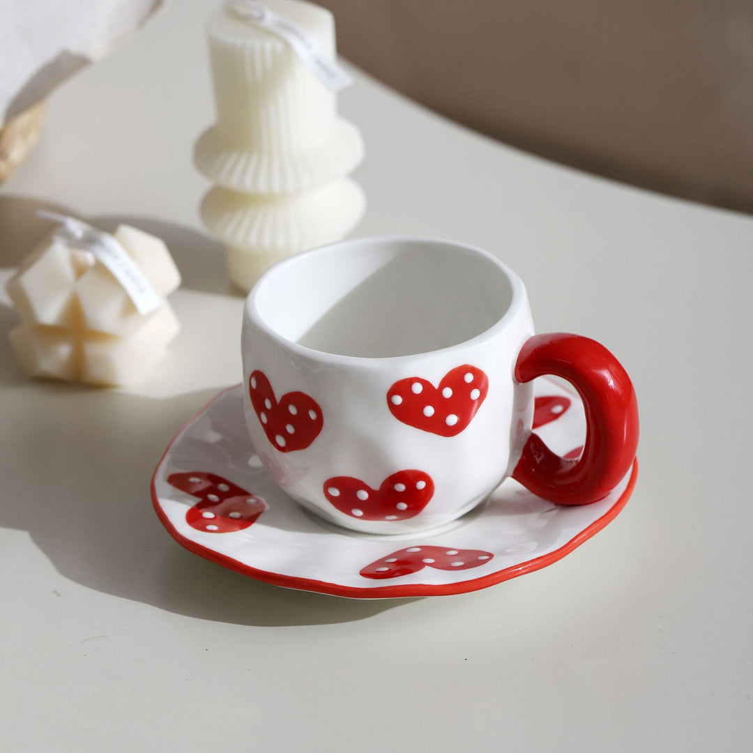 Ceramic mug with hand-painted tulip pattern and organic shape