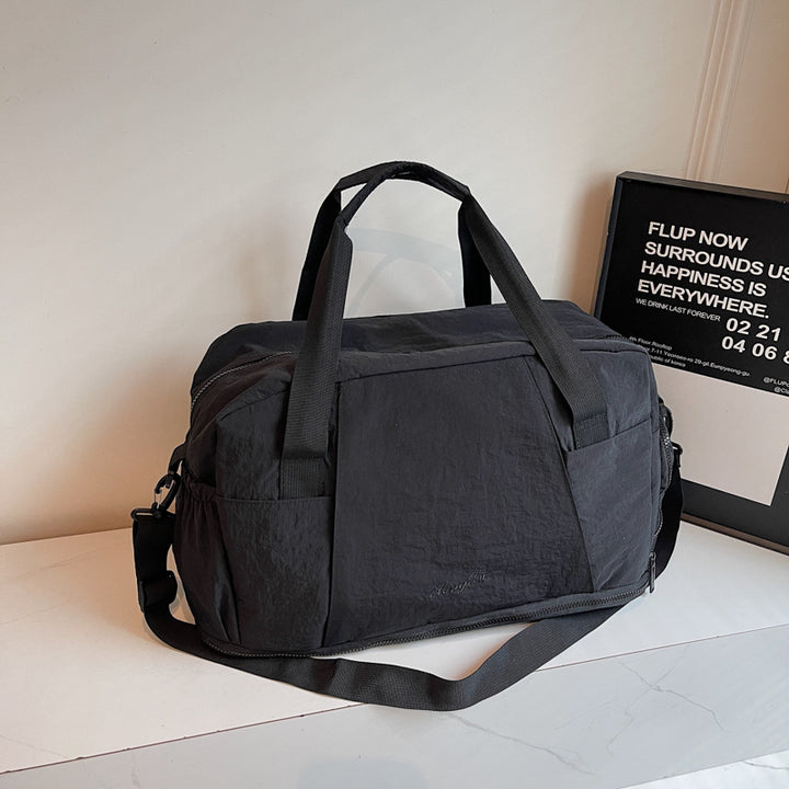 Sporty travel bag with practical outer pockets Kalsten