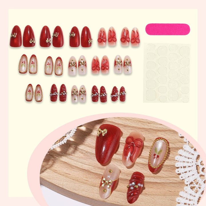 Acrylic nail set with festive designs and glitter elements Kalsten