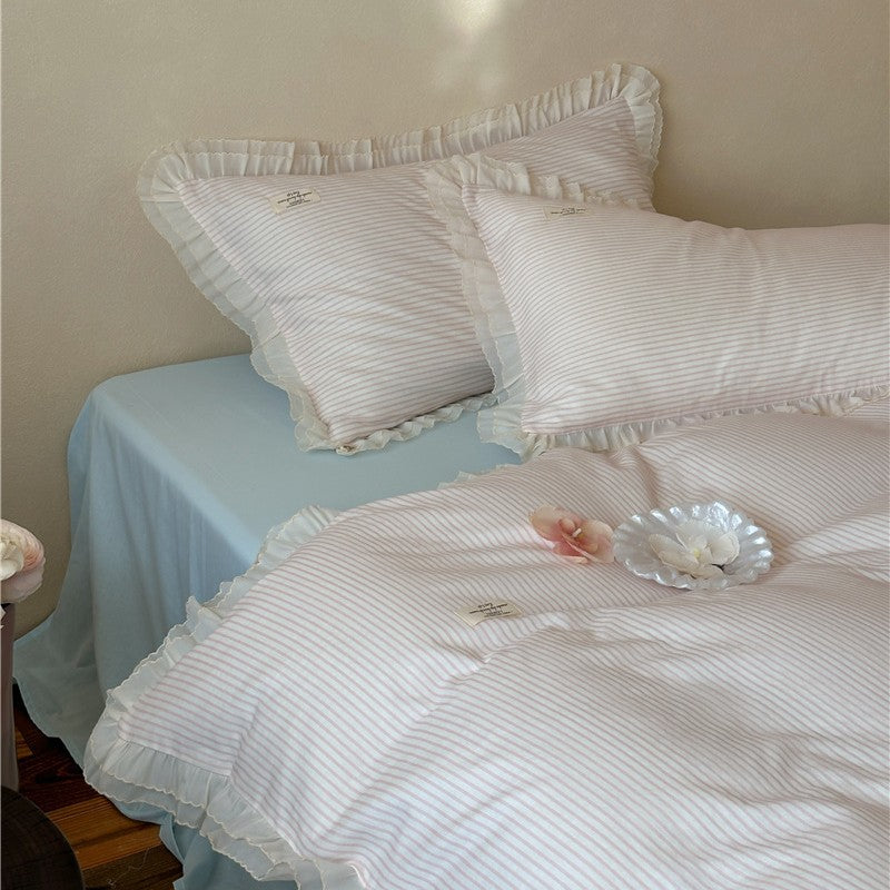 Bedding set made of cotton percale with a fine stripe pattern and gathered ruffle