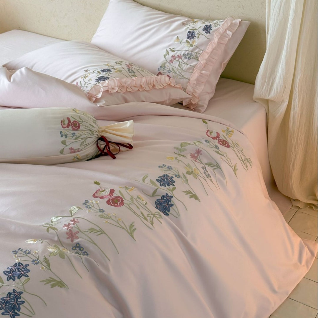 Embroidered duvet cover set with fine floral trim and soft satin feel