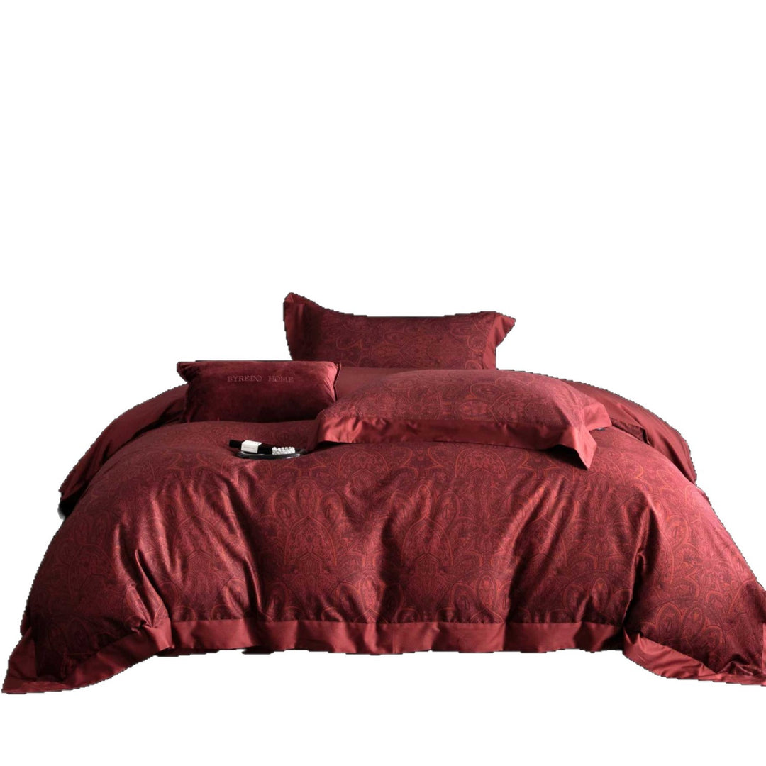 Reversible cotton satin bedding set with floral jacquard, contrast piping and decorative cushion