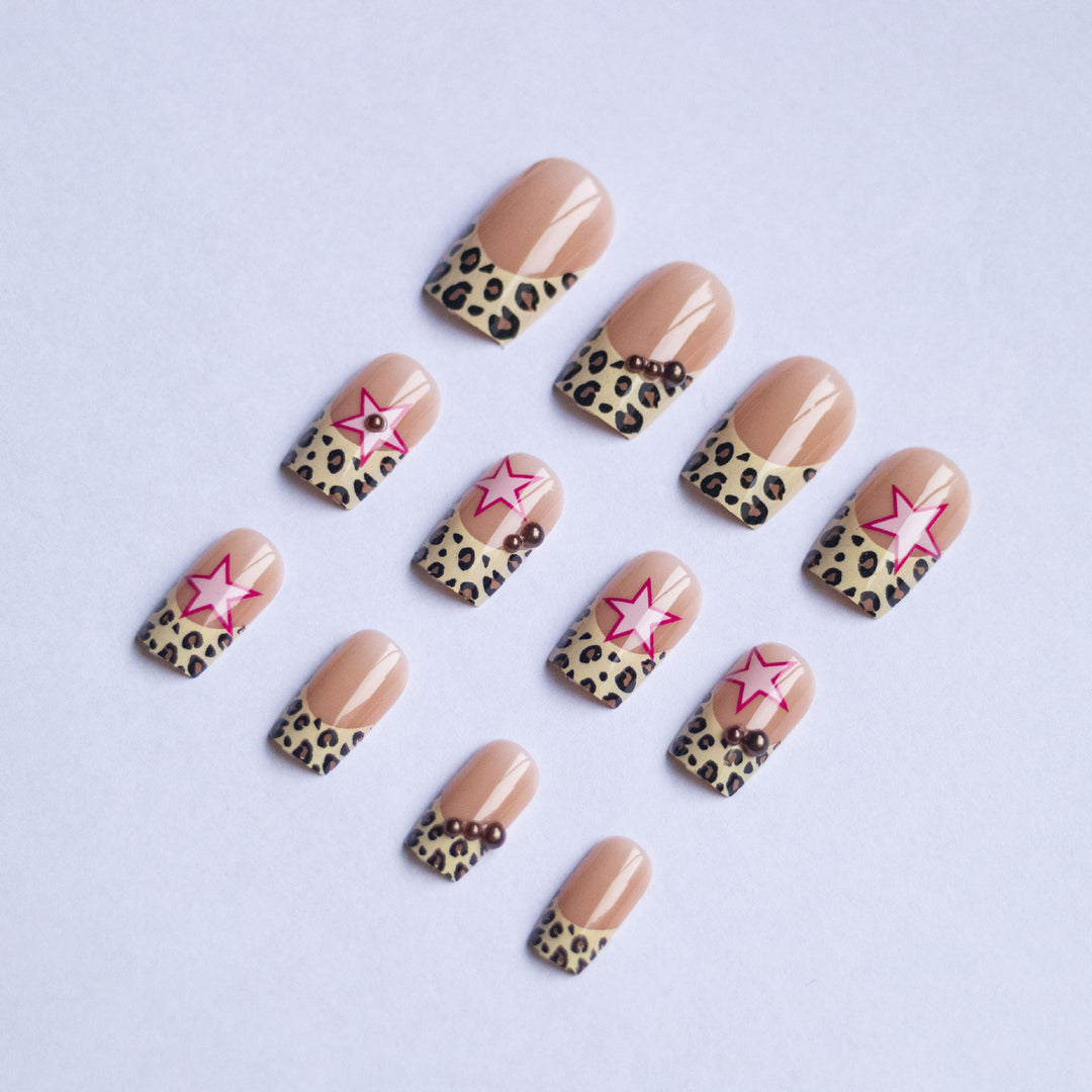 Glamorous Star and Leopard Print Nail Art