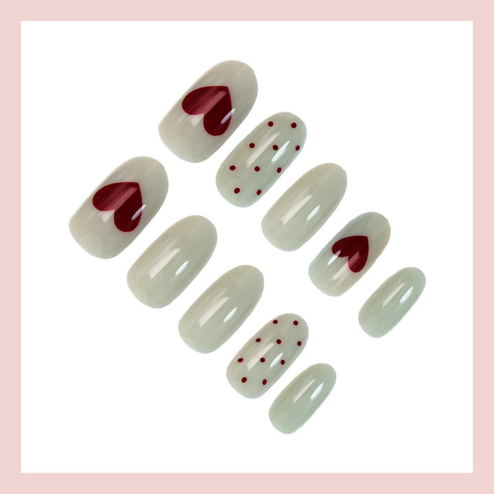 Artificial nail set with romantic heart and dot patterns Kalsten