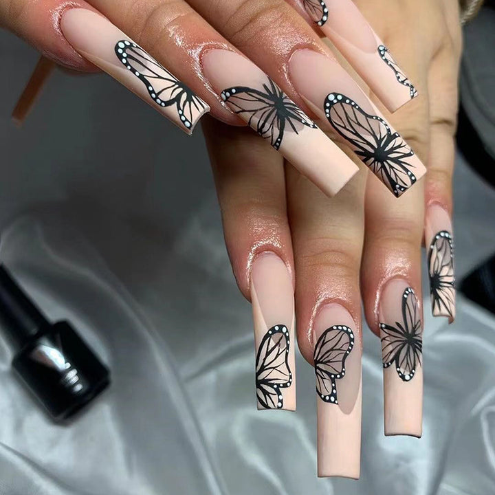 Artistic Nail Art with Butterfly Design Kalsten