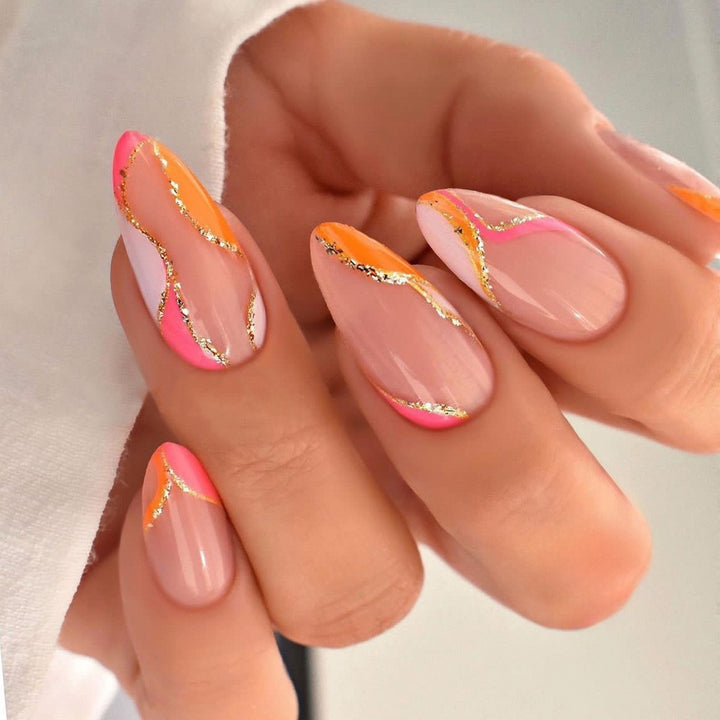Artificial nail creation with glamorous tips and glitter details Kalsten