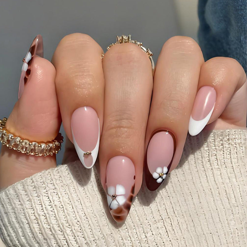 Art nail set with elegant flower and ombré designs Kalsten