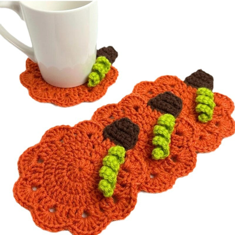Hand-crocheted pumpkin pot holder and table mat made of cotton yarn