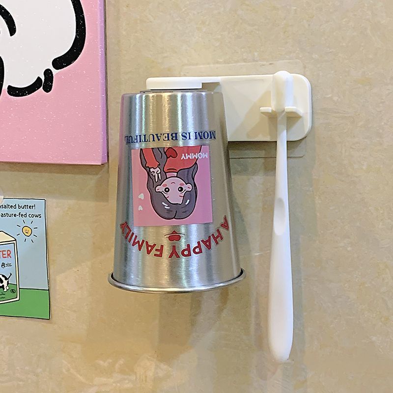Wall-mounted cup with playful design Kalsten