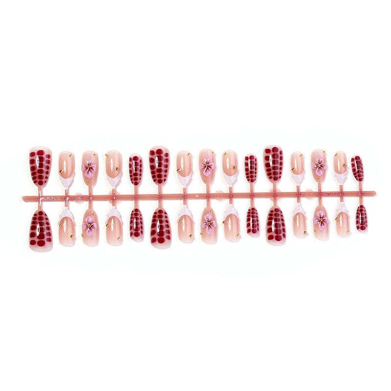 Artificial nail set with exciting flower and glitter designs Kalsten