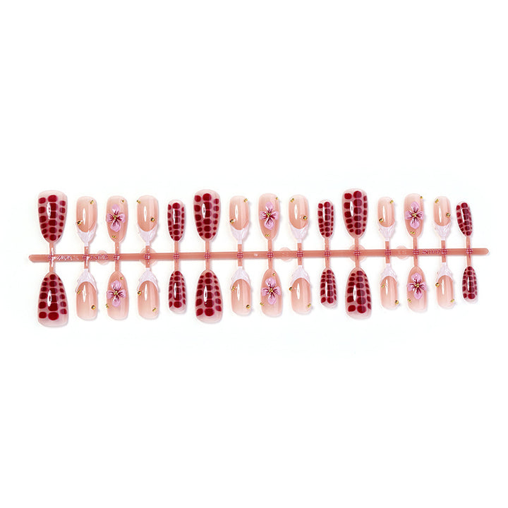 Artificial nail set with exciting flower and glitter designs Kalsten
