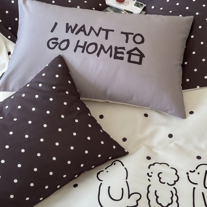 Reversible bedding set made of cotton blend with polka dot pattern and minimalist animal illustration