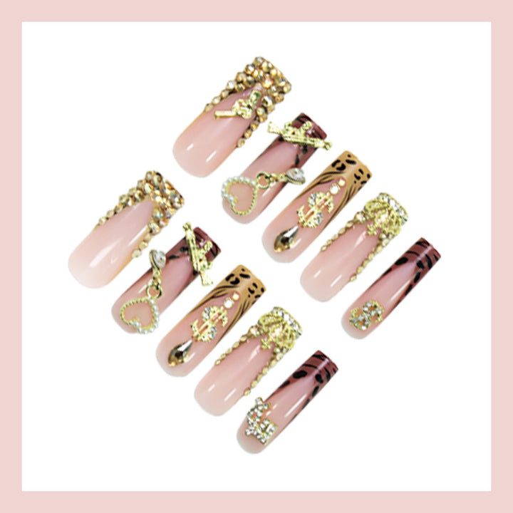 Artificial nail set with elegant golden and animal decorations Kalsten