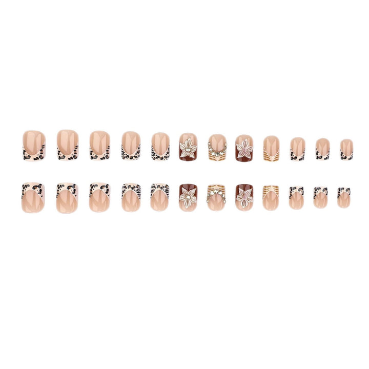 Artificial nail set with floral embellishments and elegant glitter details Kalsten