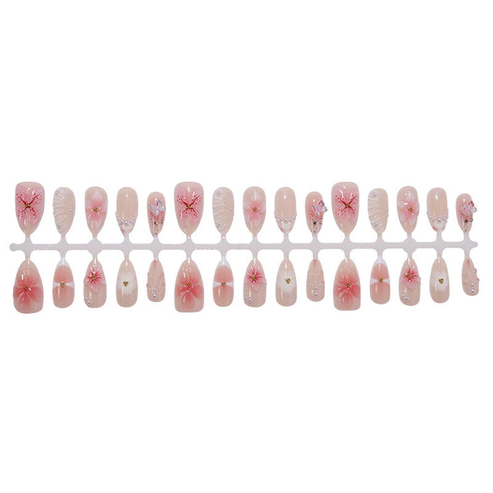 Art nail set with delicate flower and jewelry details Kalsten