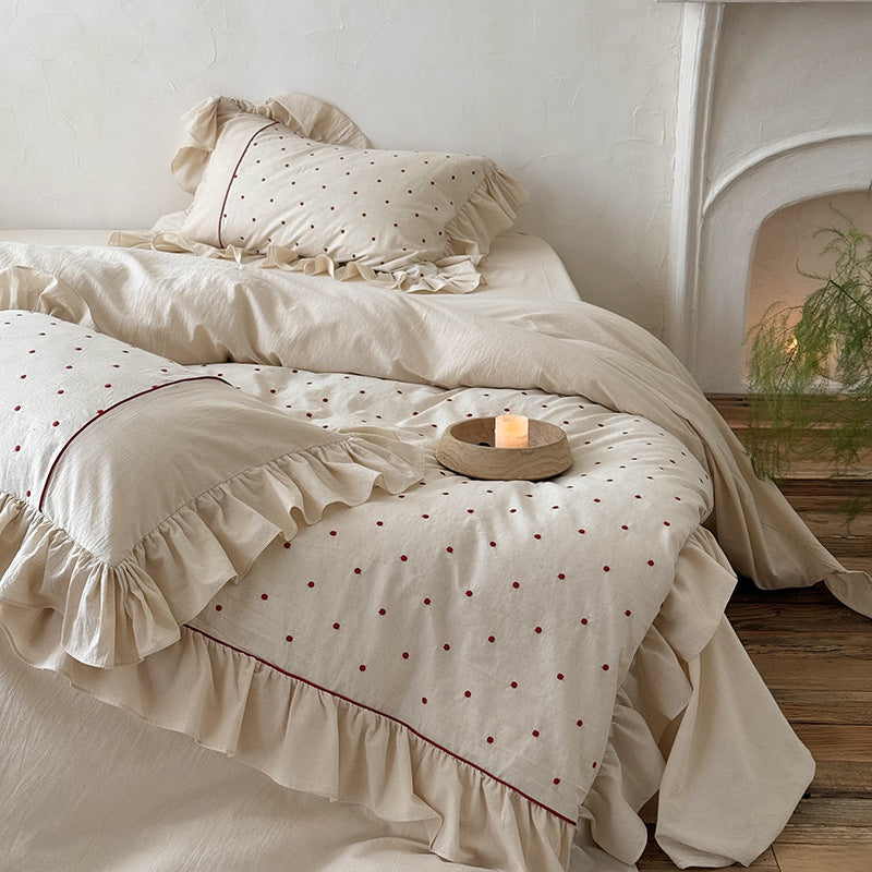 Duvet cover set with ruffle, embroidered dots, and stonewashed cotton finish