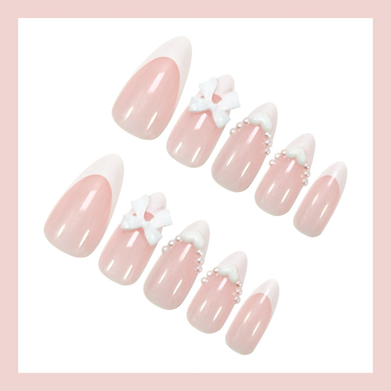 Art nail set with romantic bow and heart decorations Kalsten