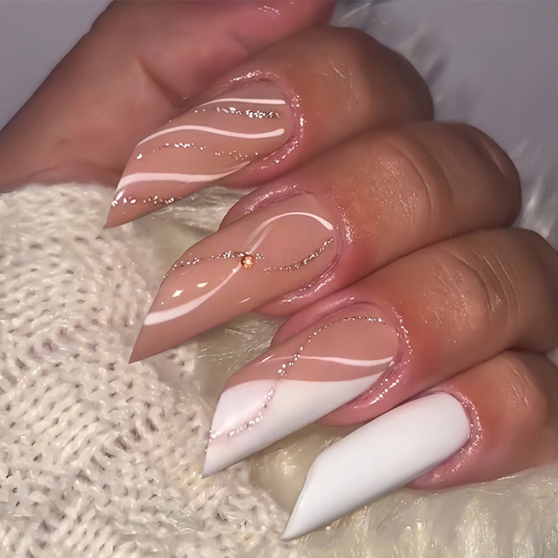 Acrylic nail set with elegant wave patterns and glitter accents Kalsten