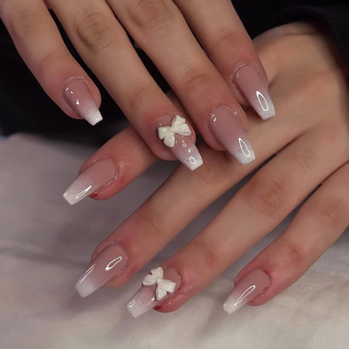Artful Nail Art with Flower Design and Blue French Tip Kalsten