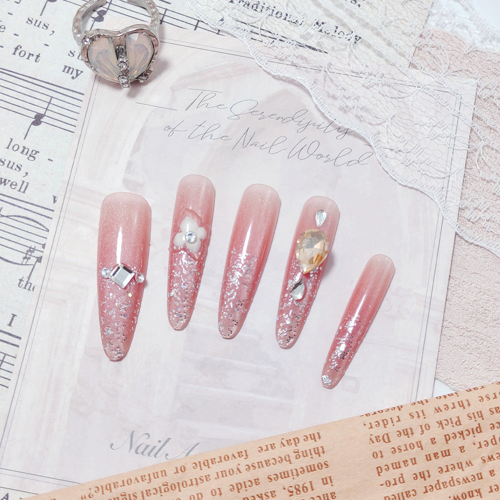 Artificial nail set with glitter and flower accents Kalsten