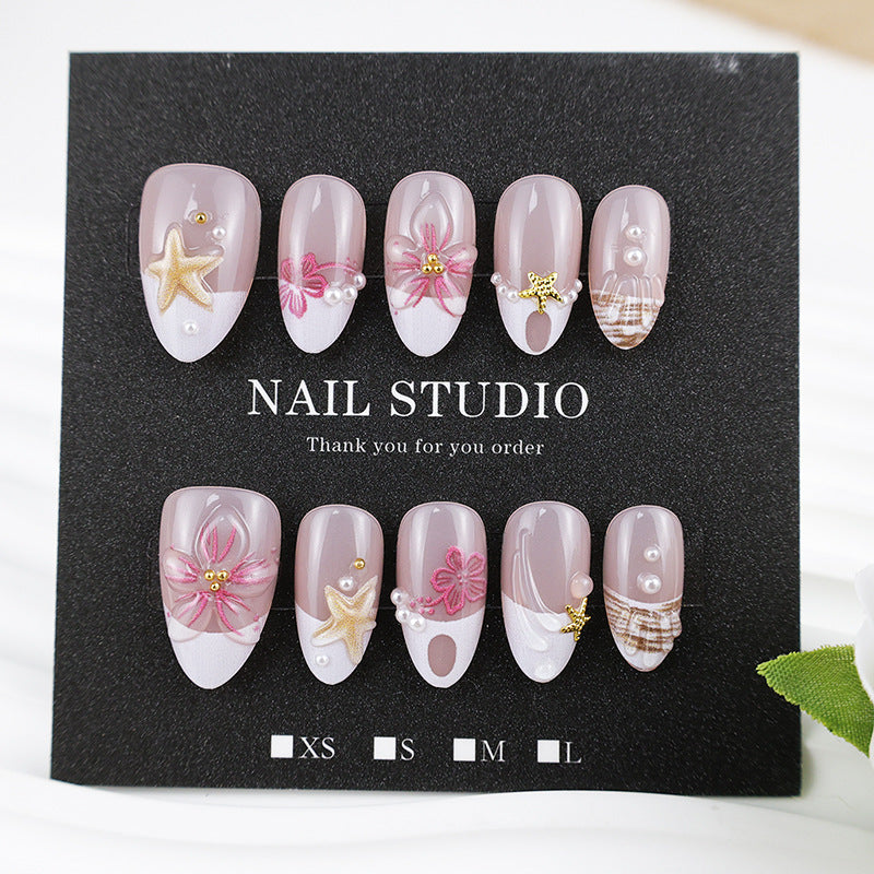 Artificial nail set with maritime details and floral accents Kalsten