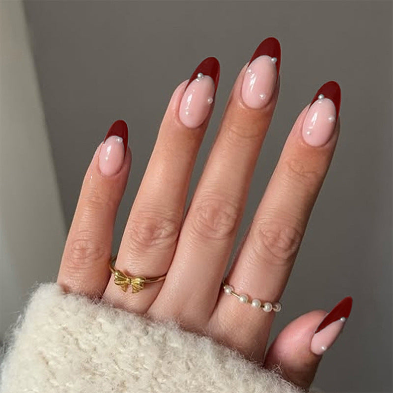 Acrylic nail set with elegant French tip and glamorous accents Kalsten
