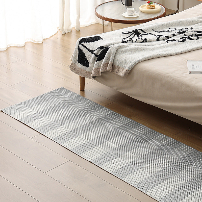 Flat runner rug made of cotton blend with checked woven structure