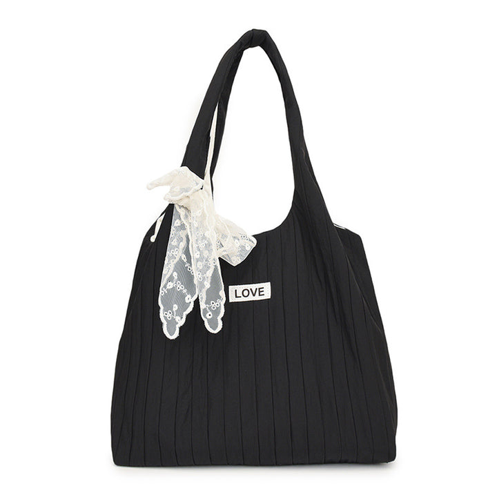Leisure bag with structured design and playful scarf Kalsten