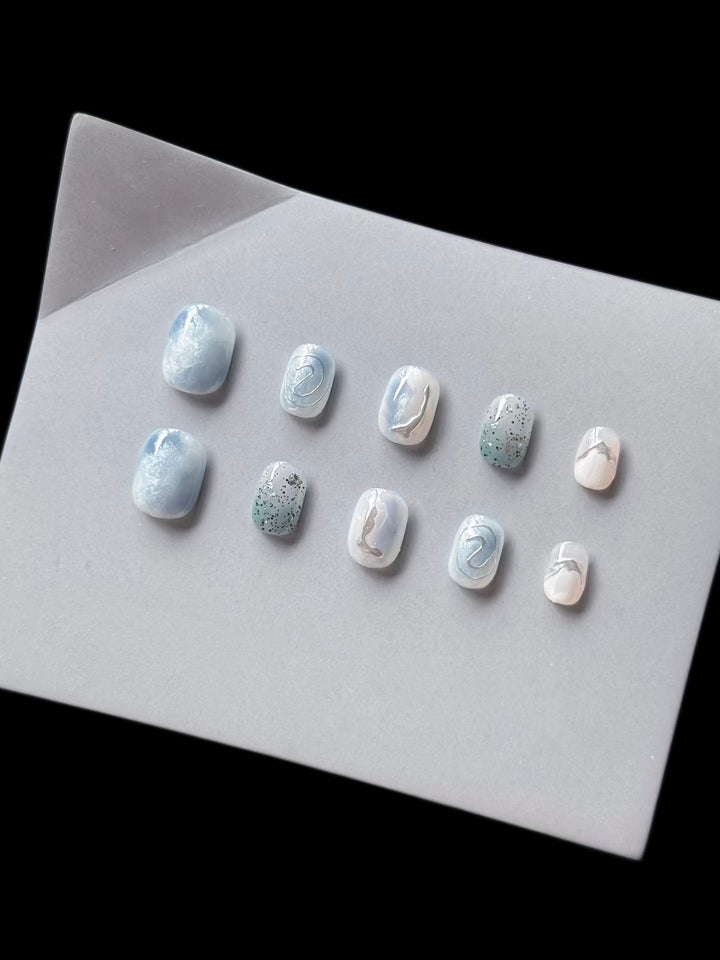 Artistic Press-On Nail Art Set with Ocean-Inspired Design