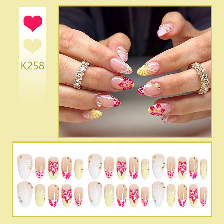 Artificial nail set with floral motifs and elegant embellishments Kalsten