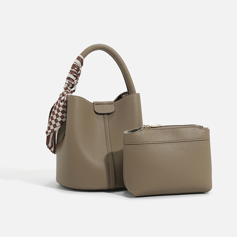 Chic Handheld Bucket Bag with Braided Accent