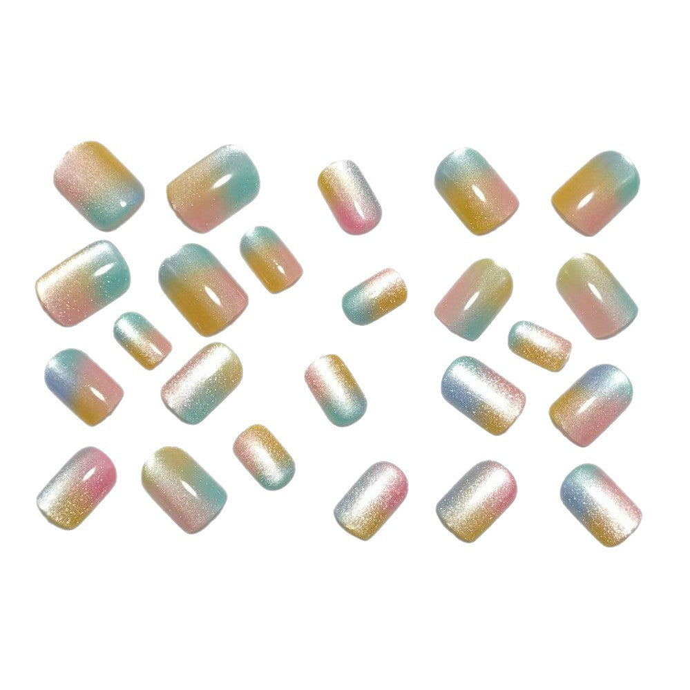 Artificial nails in delicate ombre design with glitter effects Kalsten