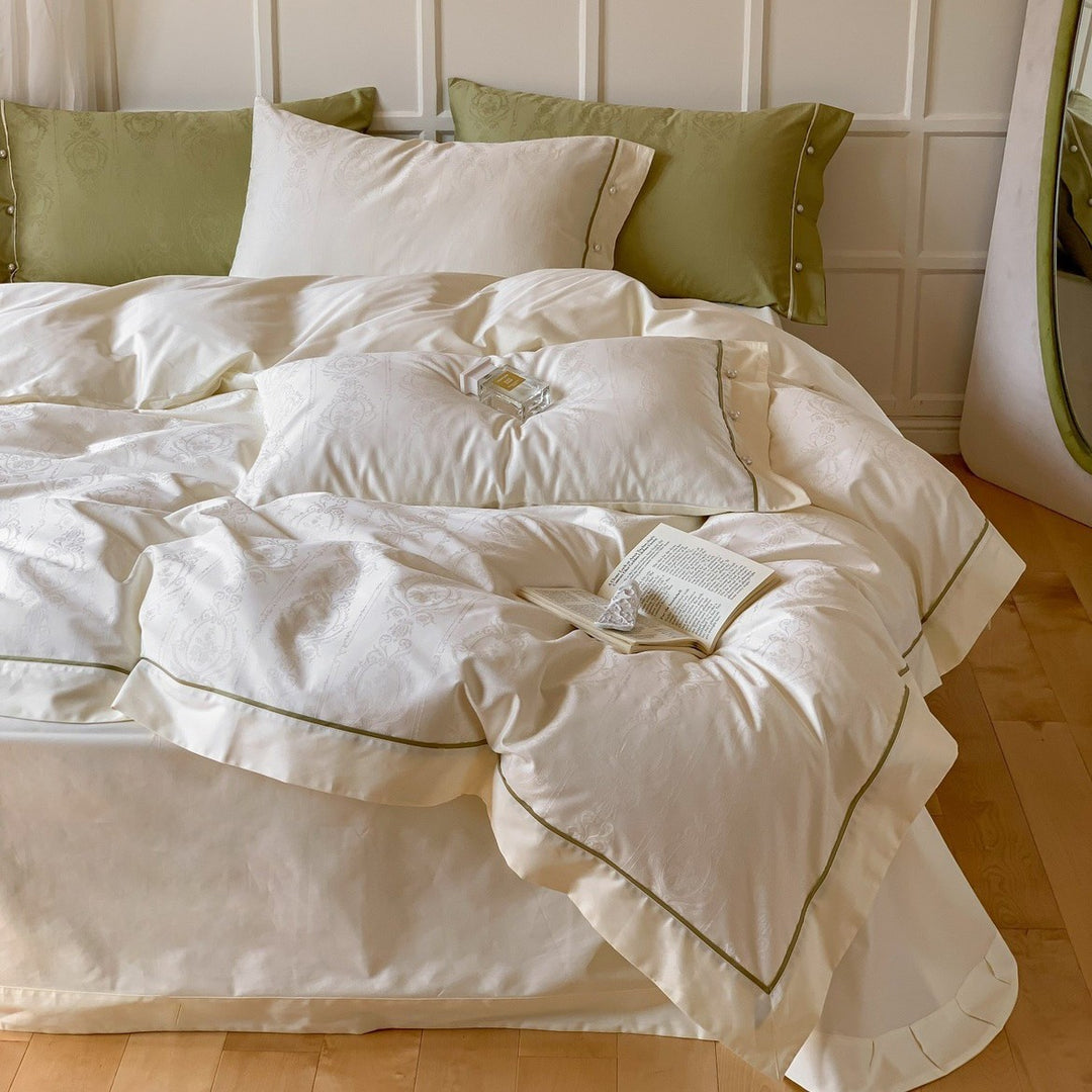 Luxurious cotton satin bed linen set with damask jacquard and contrasting piping