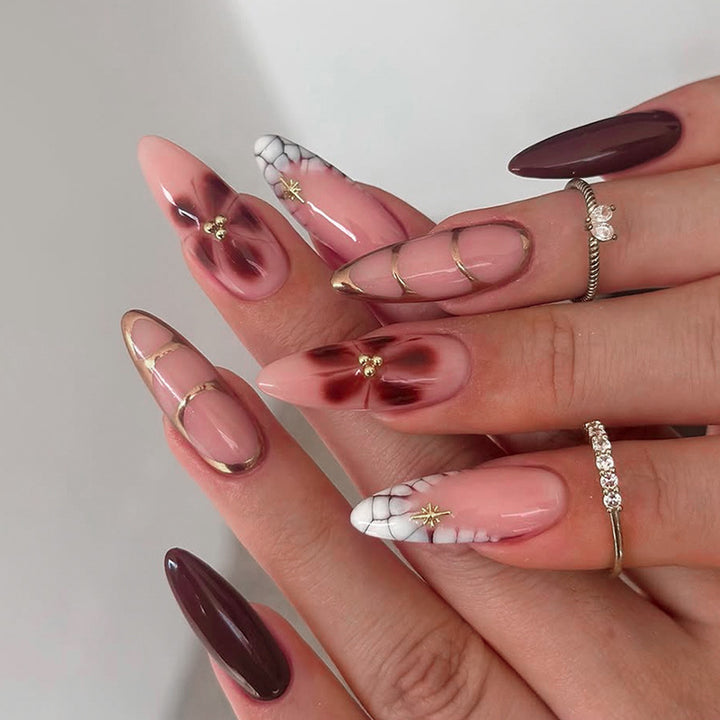 Artificial nail set with elegant floral and glamorous design elements Kalsten