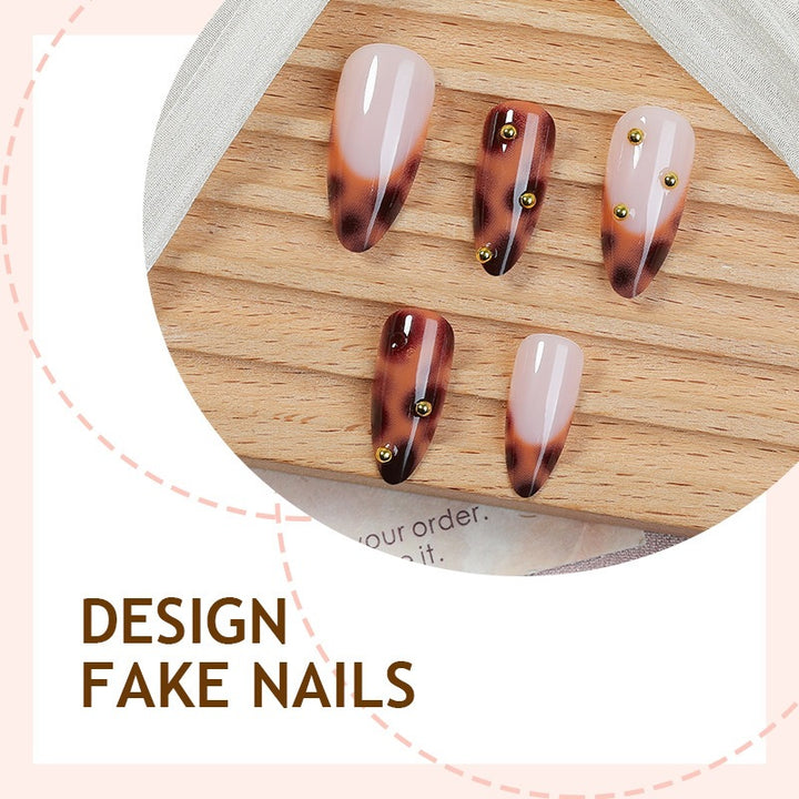 Artificial nail collection with elegant leopard design and glitter accents Kalsten