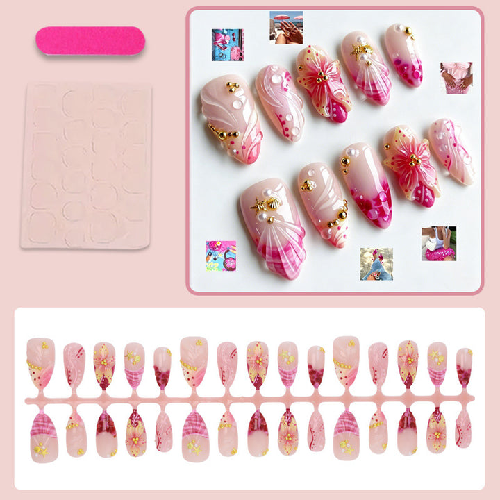 Fake nail set with floral patterns and luxurious embellishments Kalsten
