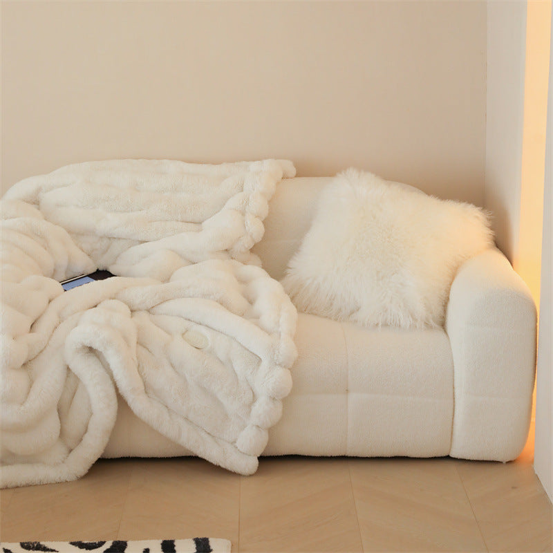 Faux fur blanket with ribbed structure design and velvety soft pile