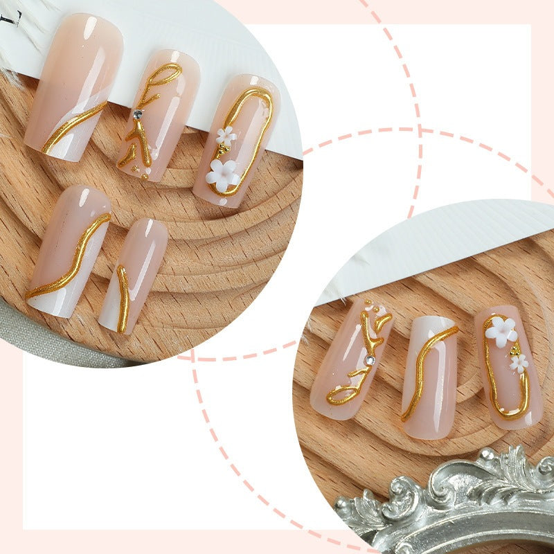 Artificial nail set with elegant gold accent and floral designs Kalsten