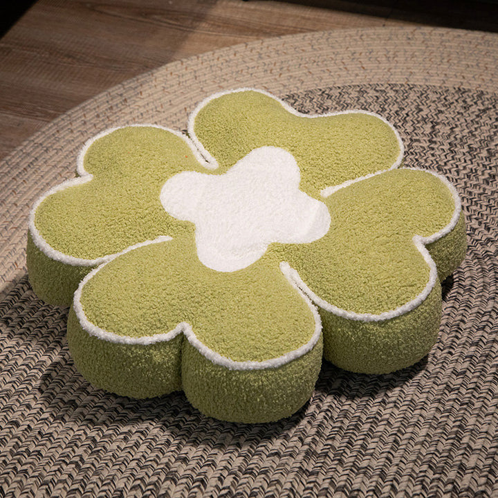Padded seat cushion in flower shape with faux leather center piece and fluffy edge padding