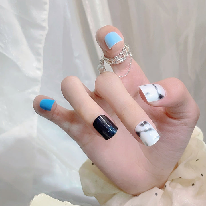 Artistic Press-On Nail Set with Marbled Patterns