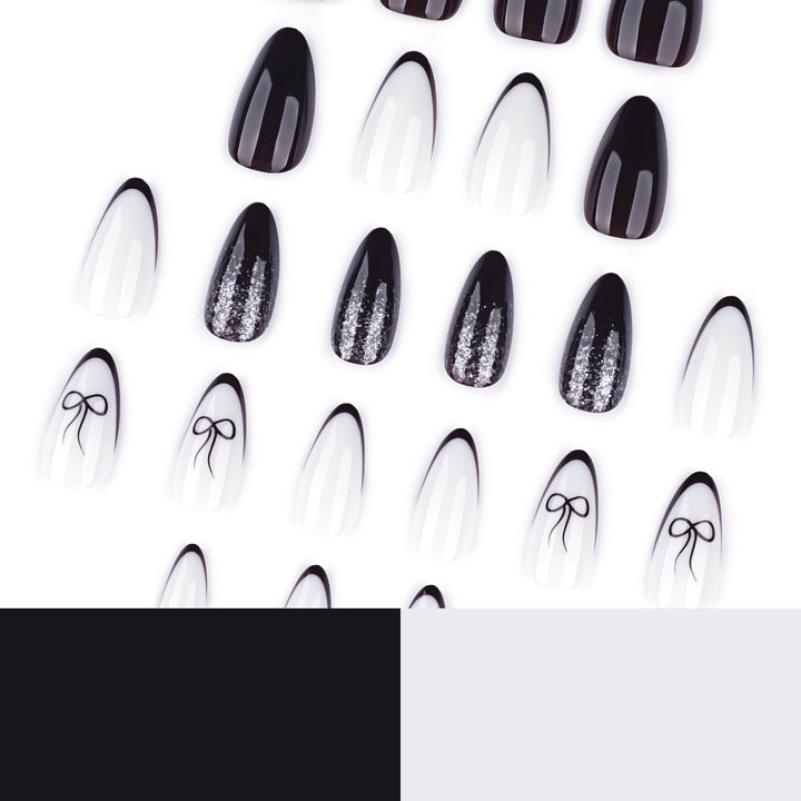 Artful nail art with elegant bow pattern and glitter accents Kalsten