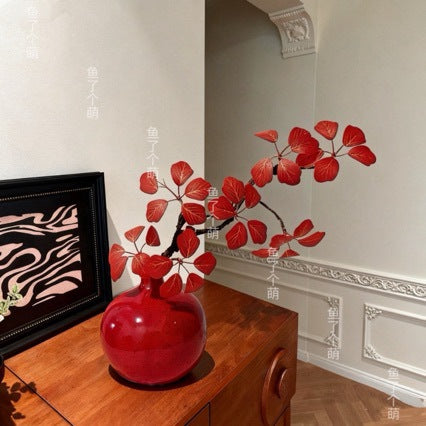 Artistic Ceramic Vase with Lifelike Floral Arrangement